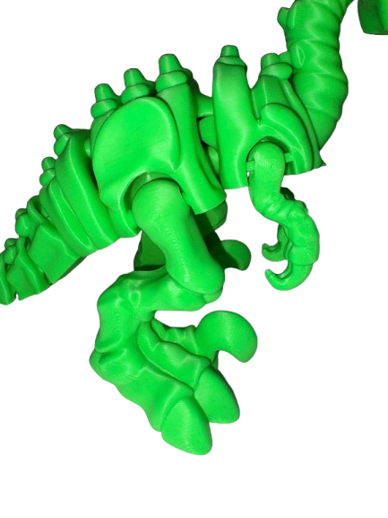 B6733C53 B2DA 48C2 AF56 753D8E5676AE Removebg Preview Close-up of a vibrant green 3D-printed articulated raptor skeleton with detailed claws and spine.