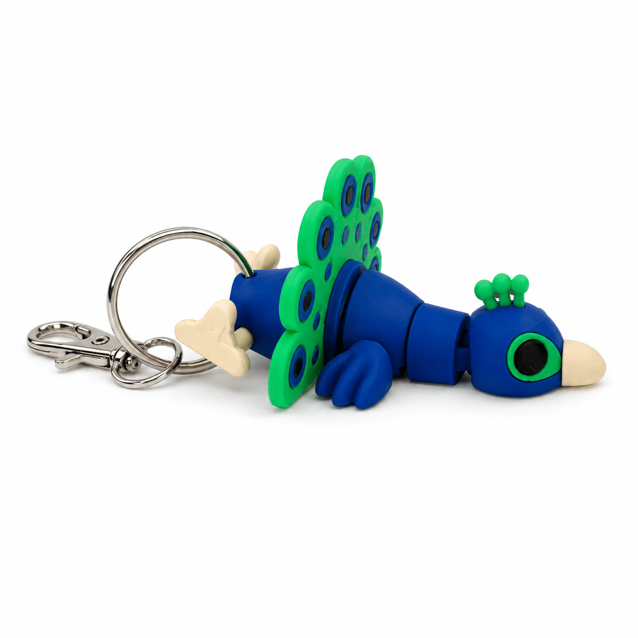 Blue and green articulated peacock keyring with a silver metal clasp. Blue and green articulated peacock keyring with a silver metal clasp.