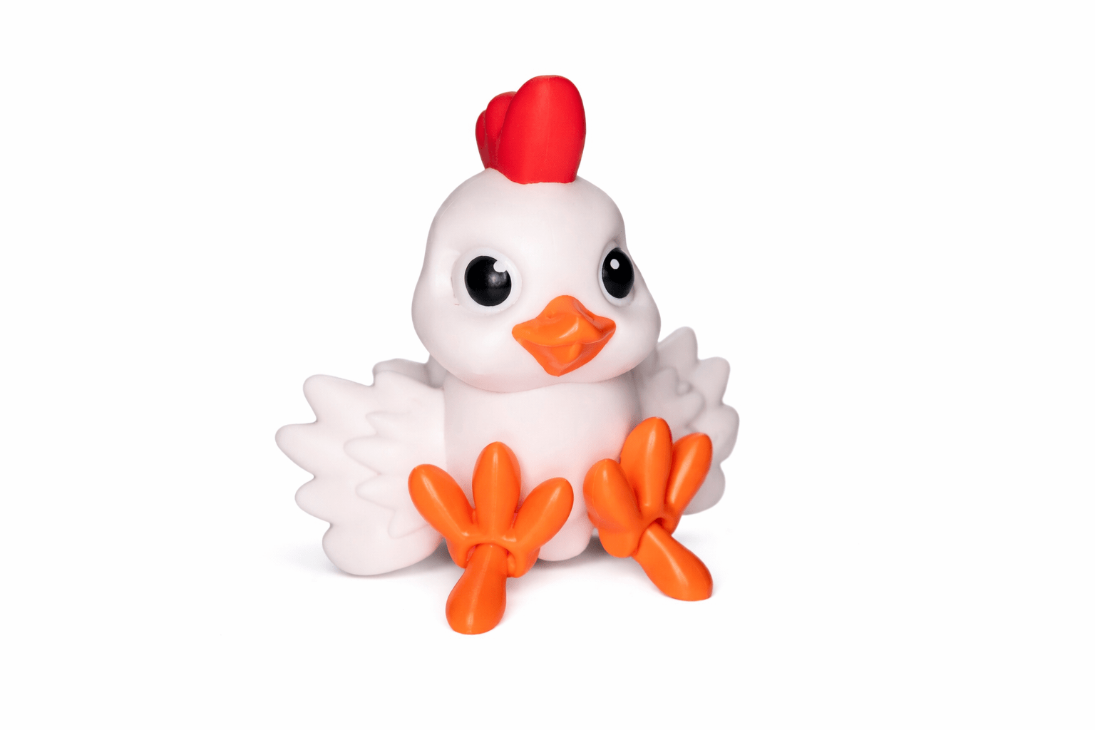 Cute 3D Printed Chicken Toy Close Up Cute white chicken figurine with red comb and orange feet
