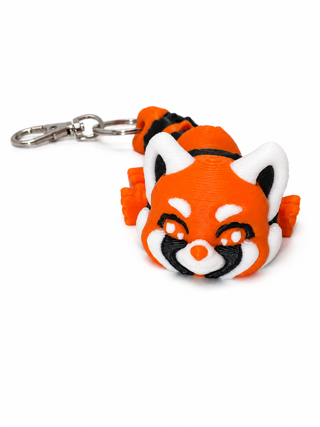 ChatGPT Image Jul 20 2026 01_46_44 PM 3D printed red panda keyring with a metal clasp and braided cord, featuring bright orange, black, and white colors.