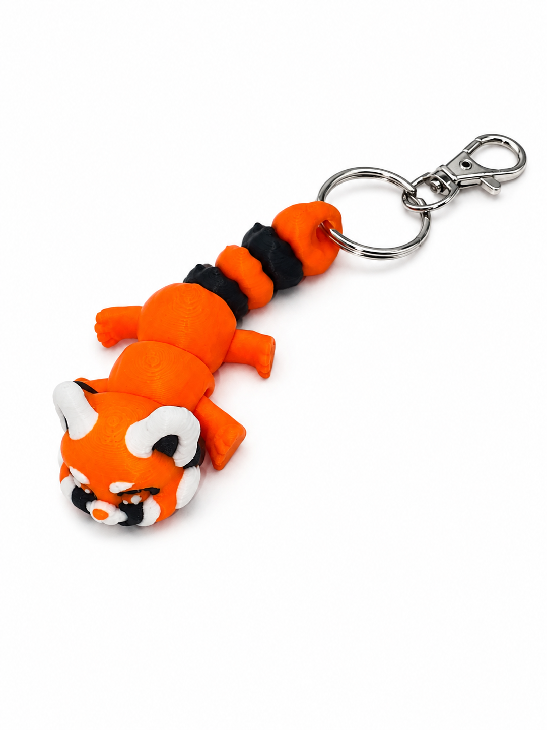 ChatGPT Image Jul 20 2026 01_59_38 PM 3D printed red panda keyring with a segmented body and metal clasp.
